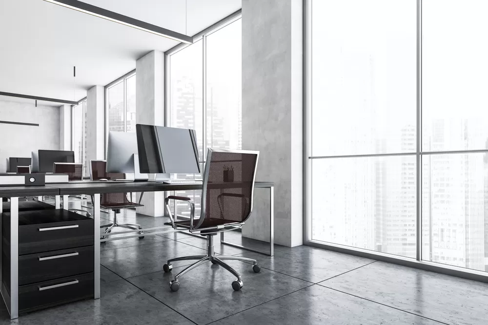 Office,Room,With,Armchairs,And,Computers,On,The,Tables,Near