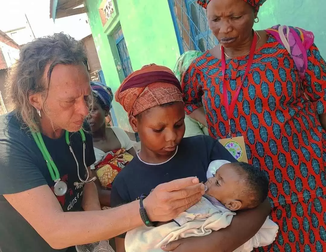 solidarietà arte scatti autore beneficenza